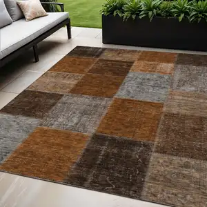 Photo of Orange And Taupe Patchwork Washable Indoor Outdoor Area Rug