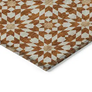 Photo of Orange Beige And Copper Floral Medallion Washable Indoor Outdoor Area Rug