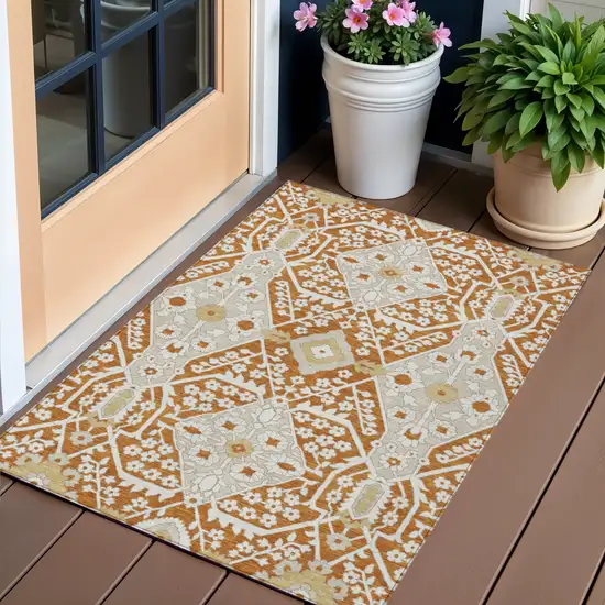 Orange Beige And Gold Floral Washable Indoor Outdoor Area Rug Photo 1