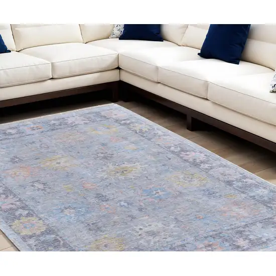 Orange Blue and Gold Floral Hand Woven Distressed Area Rug With Fringe Photo 1