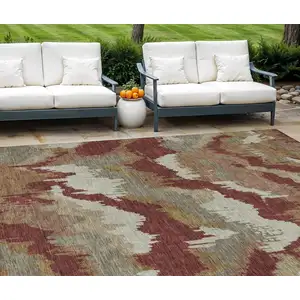 Photo of Orange Copper And Beige Abstract Washable Indoor Outdoor Area Rug