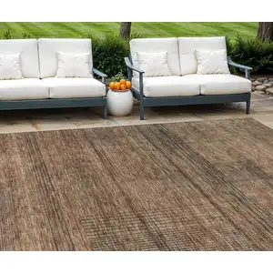 Photo of Orange Copper And Brown Striped Washable Indoor Outdoor Area Rug