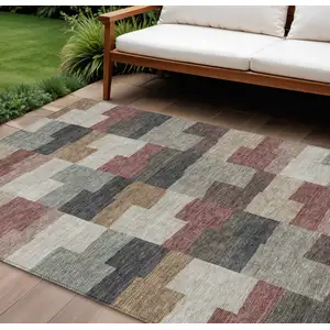 Photo of Orange Copper And Charcoal Geometric Washable Indoor Outdoor Area Rug