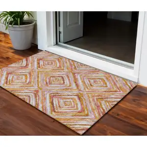 Photo of Orange Copper And Gold Geometric Washable Indoor Outdoor Area Rug