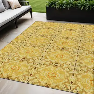 Photo of Orange Copper And Gold Medallion Washable Indoor Outdoor Area Rug