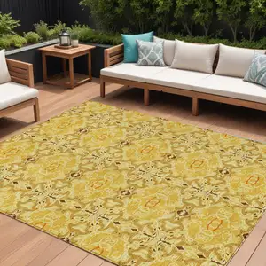 Photo of Orange Copper And Gold Medallion Washable Indoor Outdoor Area Rug