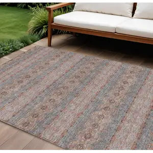 Photo of Orange Copper And Gray Floral Medallion Washable Indoor Outdoor Area Rug