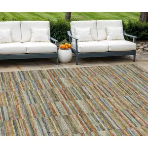 Photo of Orange Copper And Gray Striped Washable Indoor Outdoor Area Rug