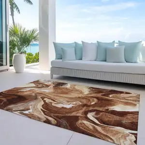 Photo of Orange Copper And Ivory Abstract Washable Indoor Outdoor Area Rug