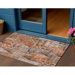 Photo of Orange Copper And Salmon Village Houses Washable Indoor Outdoor Area Rug