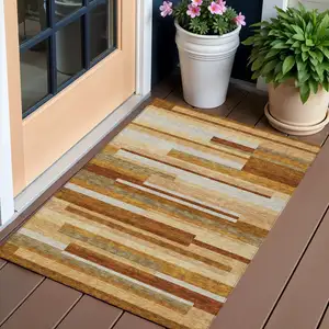 Photo of Orange Copper And Taupe Striped Washable Indoor Outdoor Area Rug