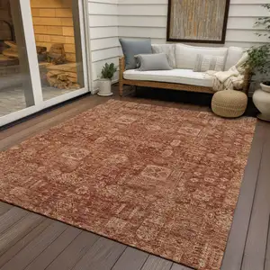 Photo of Orange Copper And Terra Cotta Oriental Washable Indoor Outdoor Area Rug