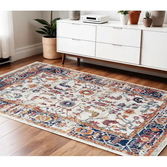 Ivory Navy and Orange Floral Power Loom Area Rug Photo 1