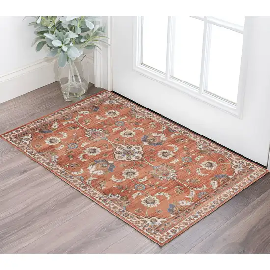 Ivory Blue and Orange Floral Power Loom Area Rug Photo 1