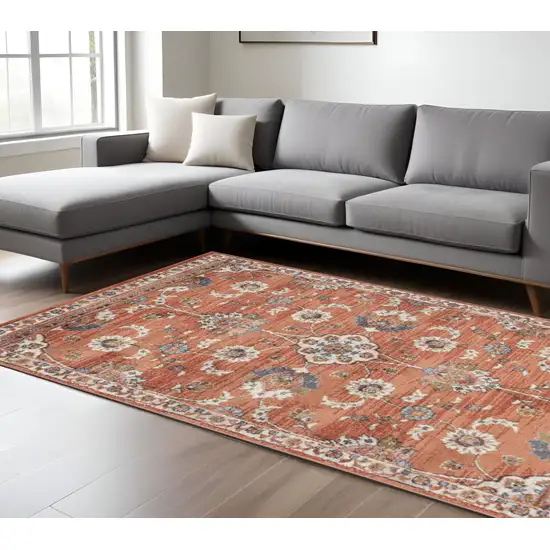 Ivory Blue and Orange Floral Power Loom Area Rug Photo 1