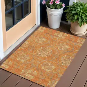 Photo of Orange Gray And Beige Floral Washable Indoor Outdoor Area Rug