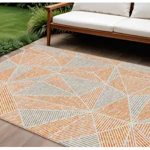 Photo of Orange Gray And Silver Geometric Washable Indoor Outdoor Area Rug