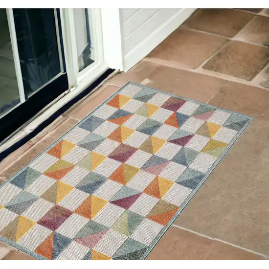 Orange And Ivory Geometric Stain Resistant Indoor Outdoor Area Rug Photo 1