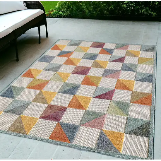 Orange And Ivory Geometric Stain Resistant Indoor Outdoor Area Rug Photo 1