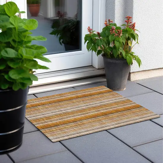 Orange Ivory and Gray Striped Washable Non Skid Indoor Outdoor Area Rug Photo 9