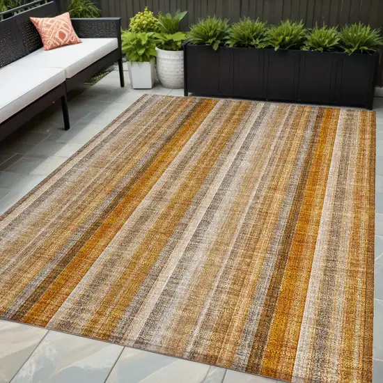 Orange Ivory and Gray Striped Washable Non Skid Indoor Outdoor Area Rug Photo 1