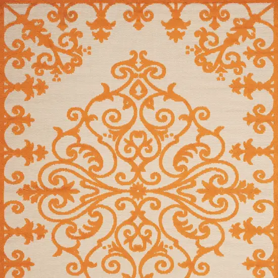 Orange And Ivory Damask Indoor Outdoor Area Rug Photo 6