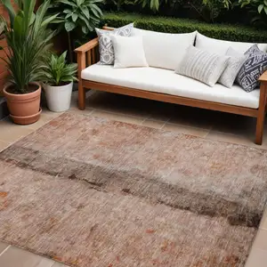 Photo of Orange Peach And Brown Abstract Washable Indoor Outdoor Area Rug