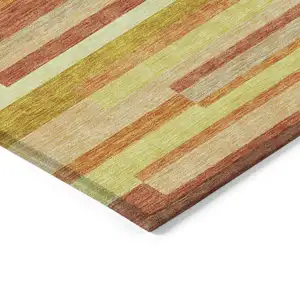 Photo of Orange Salmon And Lime Green Striped Washable Indoor Outdoor Area Rug