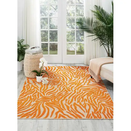 Orange And Ivory Abstract Stain Resistant Indoor Outdoor Area Rug Photo 4