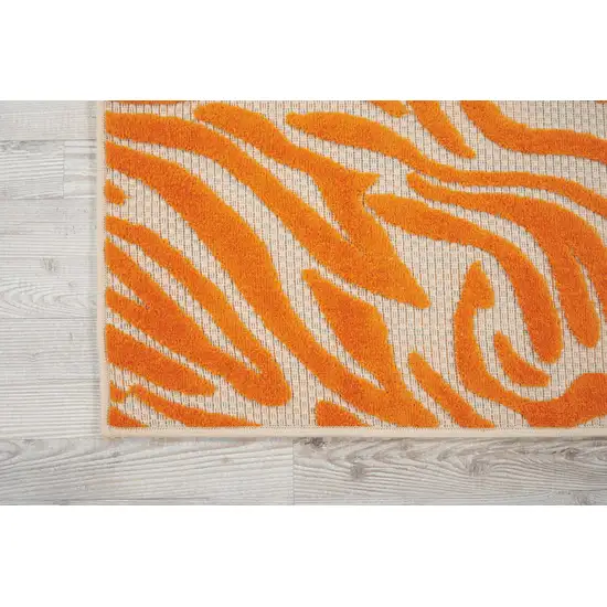 Orange And Ivory Abstract Stain Resistant Indoor Outdoor Area Rug Photo 2