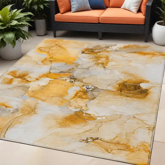 Orange and Ivory Abstract Washable Indoor Outdoor Area Rug Photo 1