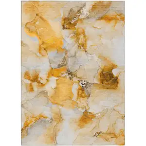 Photo of Orange and Ivory Abstract Washable Non Skid Indoor Outdoor Area Rug