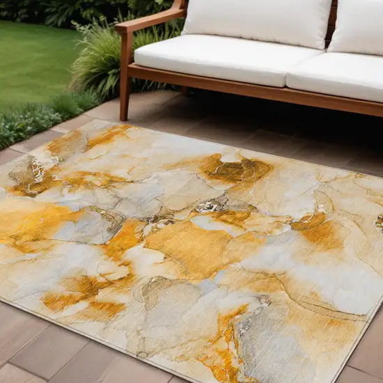 Orange and Ivory Abstract Washable Indoor Outdoor Area Rug Photo 1