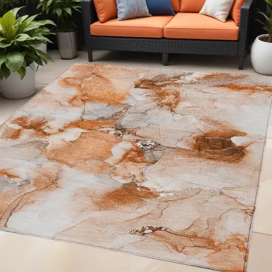 Orange and Ivory Abstract Washable Non Skid Indoor Outdoor Area Rug Photo 1