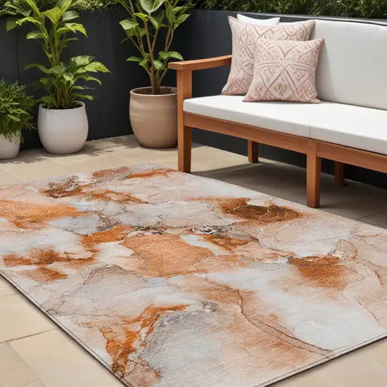 Orange and Ivory Abstract Washable Non Skid Indoor Outdoor Area Rug Photo 1