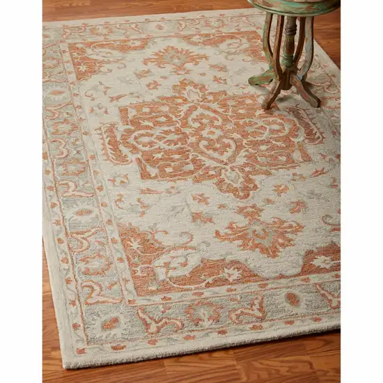 Orange and Ivory Medallion Area Rug Photo 1