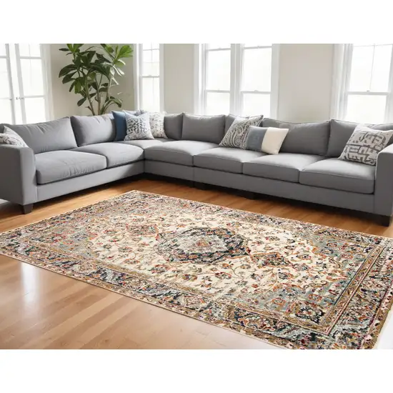 Orange and Ivory Medallion Power Loom Area Rug Photo 1