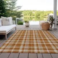 Photo of Orange and Ivory Plaid Washable Non Skid Indoor Outdoor Area Rug