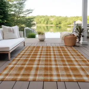 Photo of Orange and Ivory Plaid Washable Non Skid Indoor Outdoor Area Rug