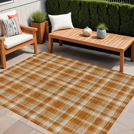 Orange and Ivory Plaid Washable Non Skid Indoor Outdoor Area Rug Photo 1