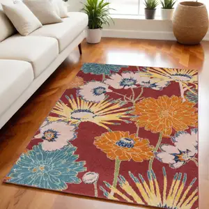 Photo of Orange and Red Floral Power Loom Area Rug