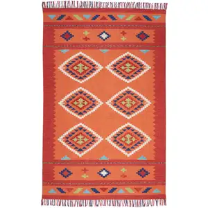 Photo of Orange and Red Southwestern Handmade Area Rug With Fringe