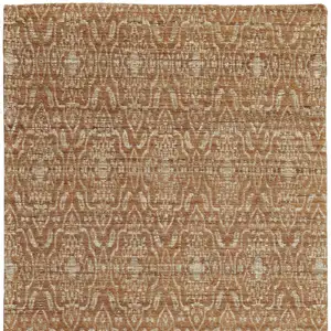 Photo of Orange and Tan Geometric Hand Woven Area Rug