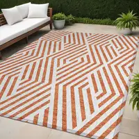 Photo of Orange and White Geometric Washable Non Skid Indoor Outdoor Area Rug