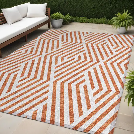 Orange and White Geometric Washable Non Skid Indoor Outdoor Area Rug Photo 1