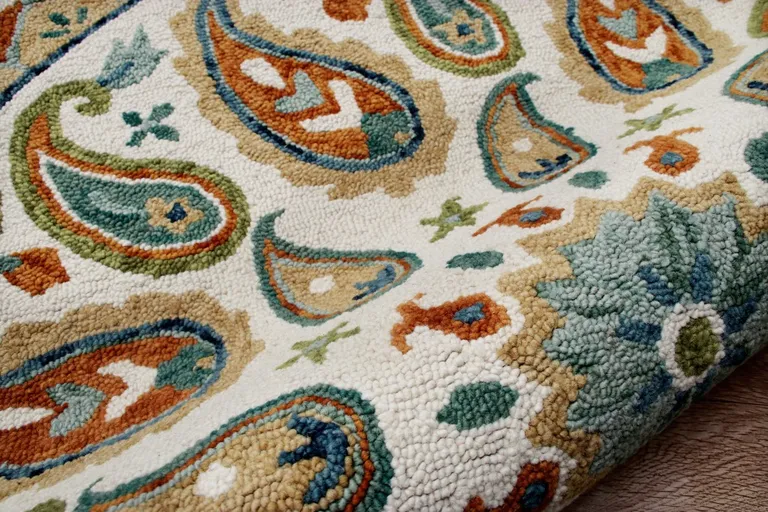 Orange and White Paisley Area Rug Photo 5