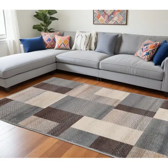 Gray Brown and Cream Patchwork Area Rug Photo 1