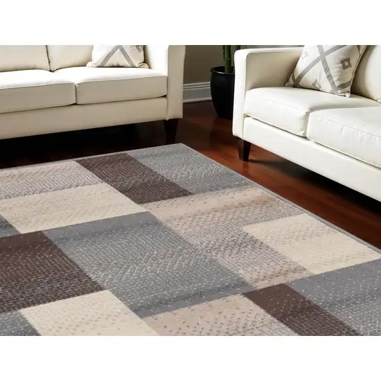 Gray Brown and Cream Patchwork Area Rug Photo 1