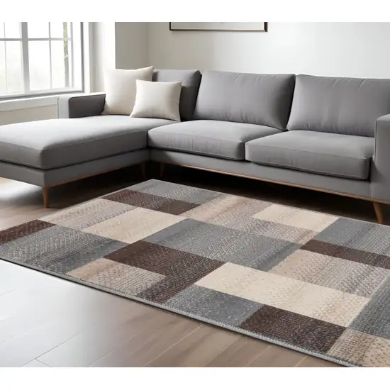 Gray Brown and Cream Patchwork Area Rug Photo 1