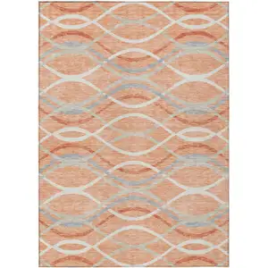 Photo of Peach Orange And Gray Abstract Washable Indoor Outdoor Area Rug